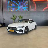 מבט צדדי לבן 2025מרצדס CLE Coupe