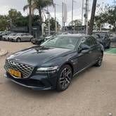 מבט צדדי כחול 2025יונדאי GENESIS  G80