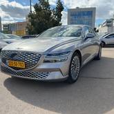מבט צדדי כסף מטאלי 2024GENESIS G80 EV