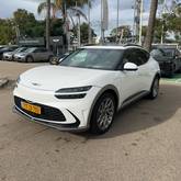 מבט צדדי לבן 2025GENESIS GV60