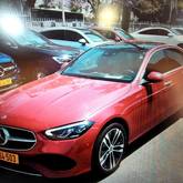 מבט צדדי אדום 2024מרצדס C-Class