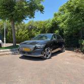 מבט צדדי שחור 2024GENESIS GV70 EV